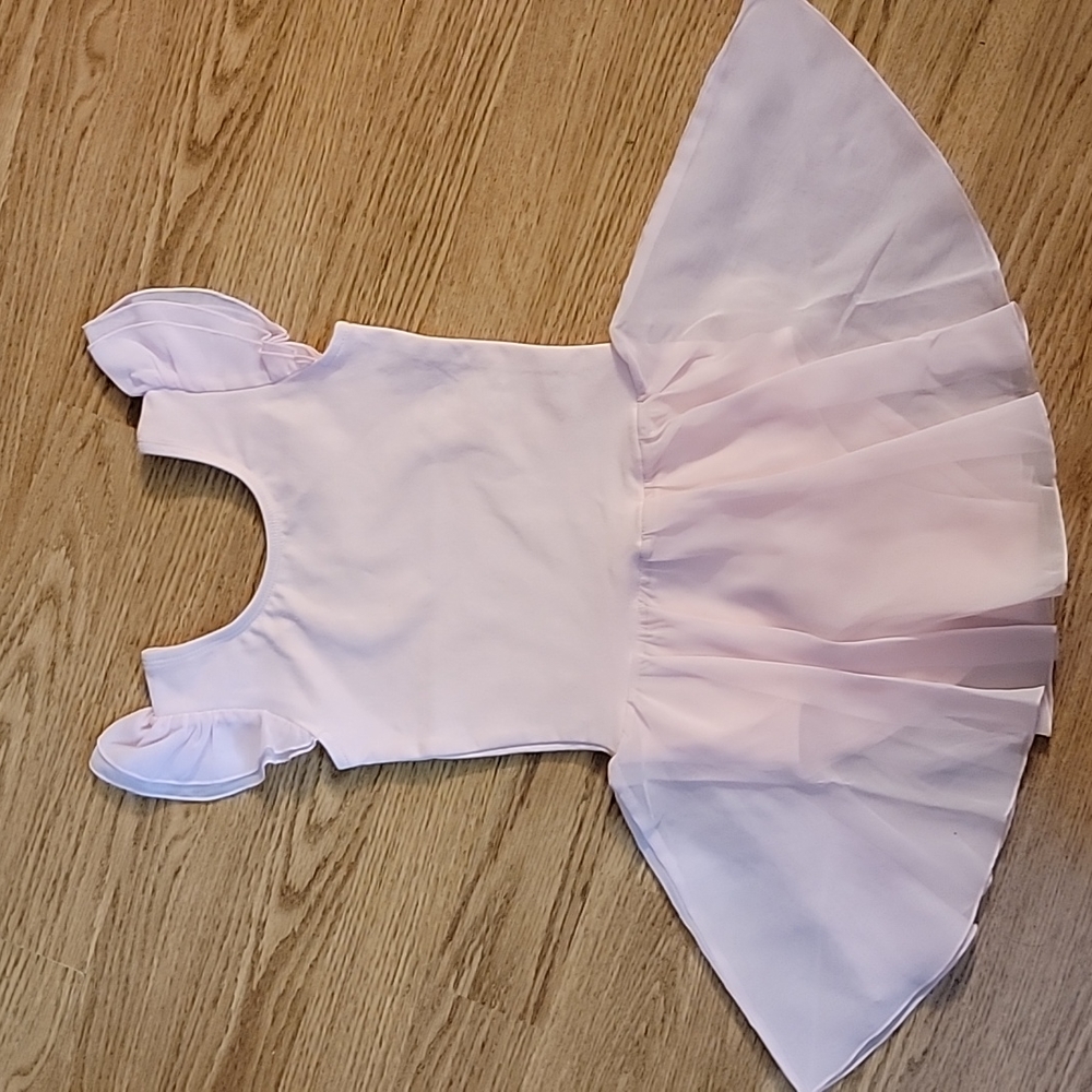 New Ballet pink leotard with ruffle sleeve.